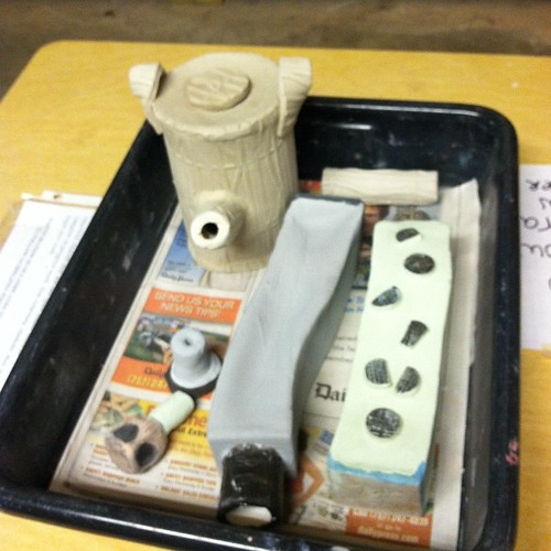Heading to the kiln: two for glaze firing and the teapot for bisque firing.