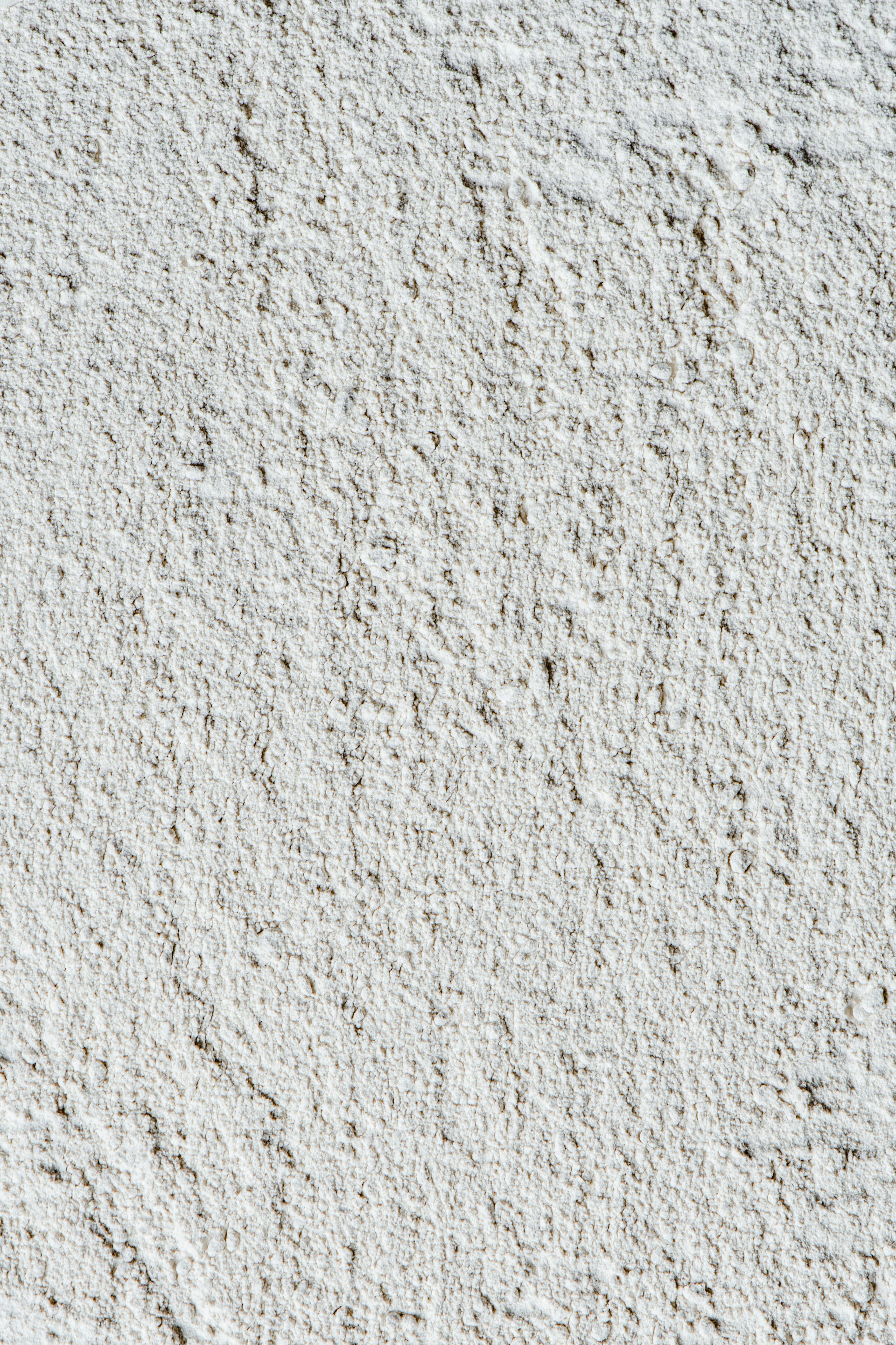 Close-up of a textured kaolin clay surface showcasing natural patterns.