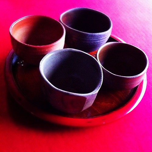 Mitsuru Isezaki was made a Okayama Prefectural Cultural Property and his brother, Jun Isezaki, a National Treasure for their artistic skills and work resurrecting medieval Bizen pottery techniques. These are four tea cups made by each of Mitsuru Isezaki's