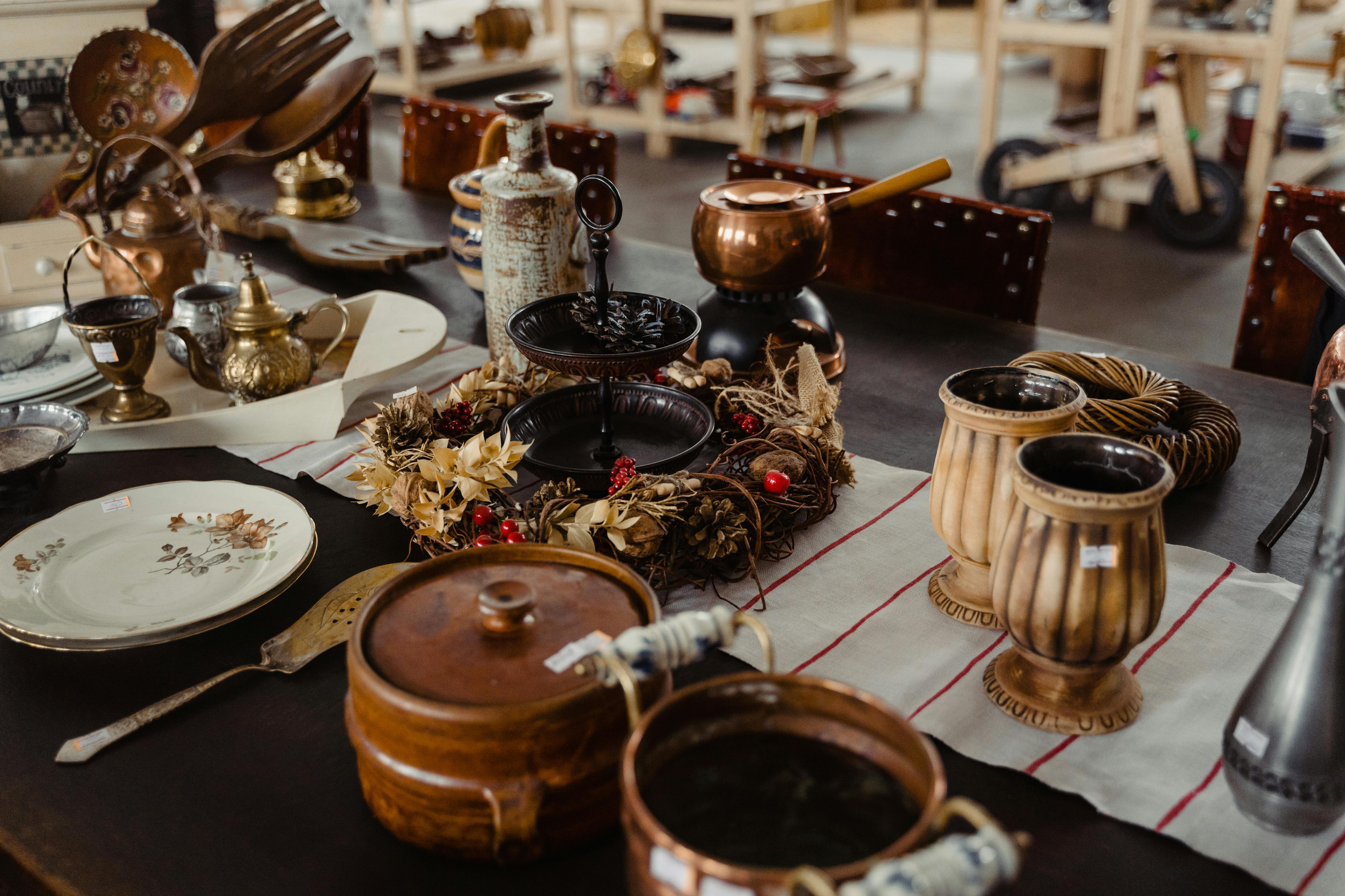 Charming collection of antique kitchenware and decor on display indoors, exuding vintage elegance.